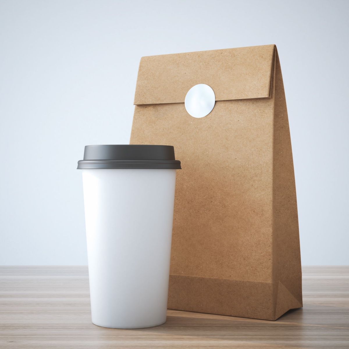 Paper bag with a coffee cup