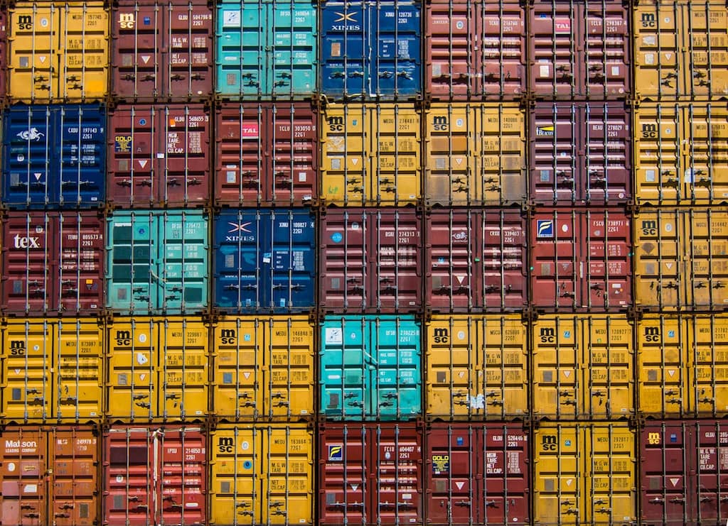 A colourful collection of stacked shipping containers