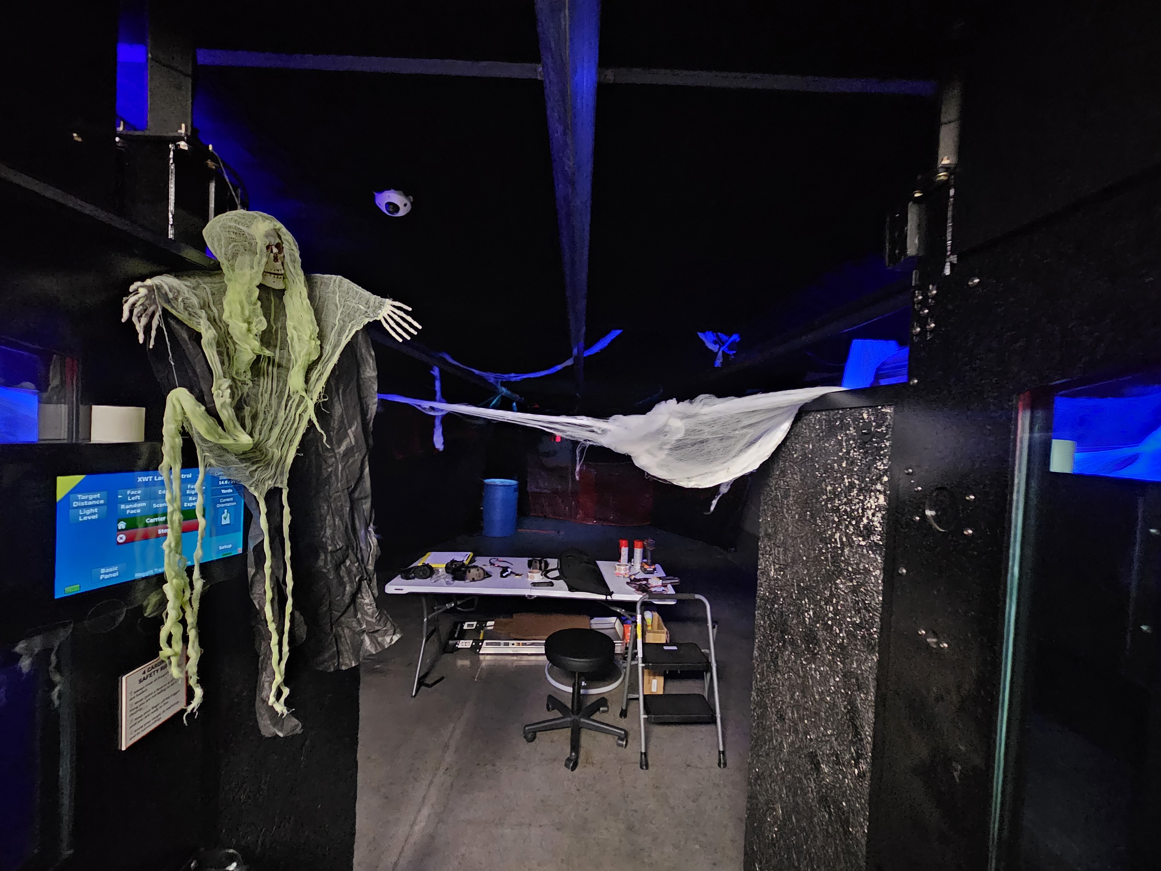 Ghoul hung over the counter, range dressed for Halloween