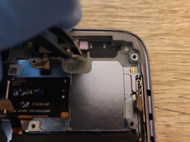 Remplacez la nappe des capteurs de luminosité ou de proximité