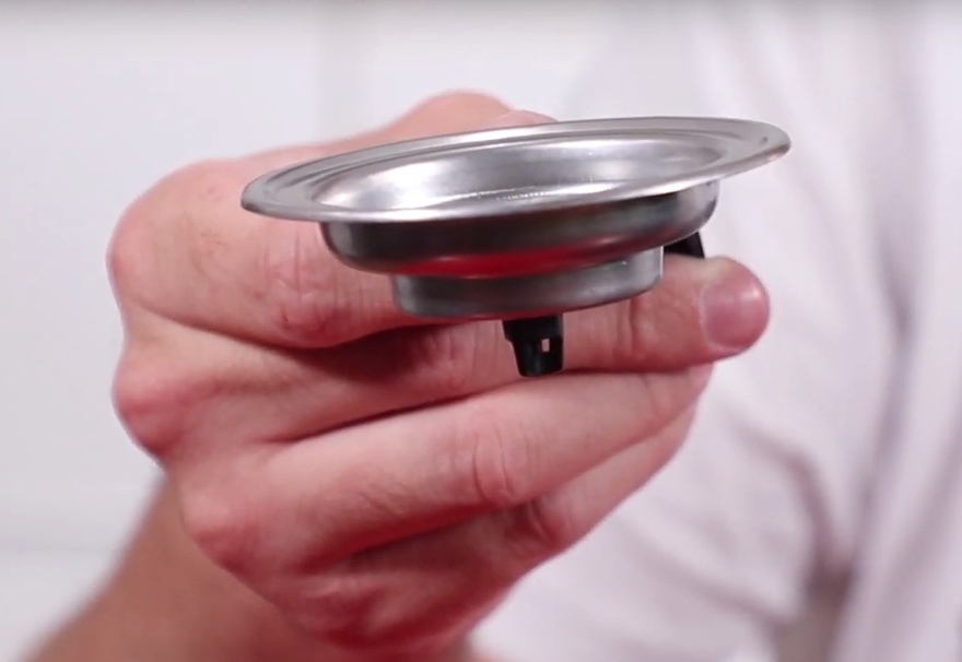 Inspectez le porte-dosette