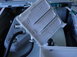 Contrôlez le répartiteur d'eau du lave-linge