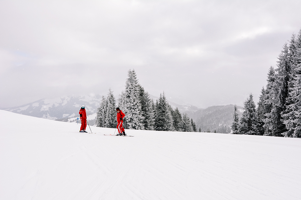 Vader Diego en gids Rupert op piste in SkiWelt Wilder Kaiser